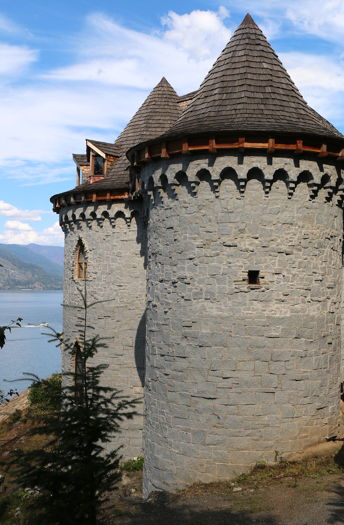 Lake Pend Oreille can be seen in the background as Castle Von Frandsen sits perched on a 70-foot cliff in the Bottle Bay area.