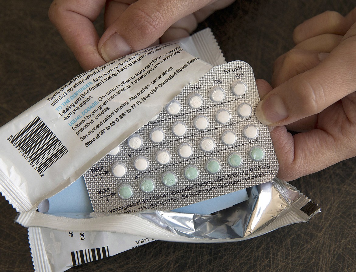 A one-month dosage of hormonal birth control pills is displayed in Sacramento, Calif., Aug. 26, 2016. A drug company is seeking U.S. approval for the first-ever birth control pill that women could buy without a prescription. The request from a French drugmaker sets up a high-stakes decision for the Food and Drug Administration amid the political fallout from the Supreme Court's recent decision overturning Roe v. Wade. (AP Photo/Rich Pedroncelli, File)