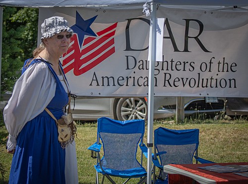 Nancy Mehaffie in period dress at the booth for the Daughters of the American Revolution. (Tracy Scott/Valley Press)