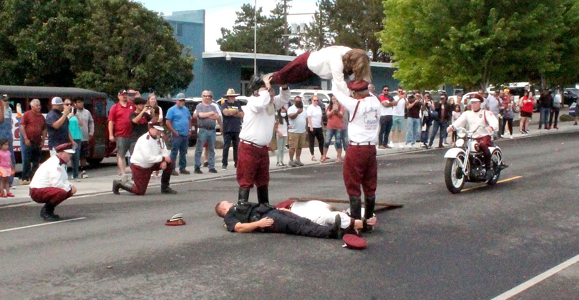 A Seattle Cossacks rider prepares to jump over a Royal City Police officer at Summerfest Saturday.