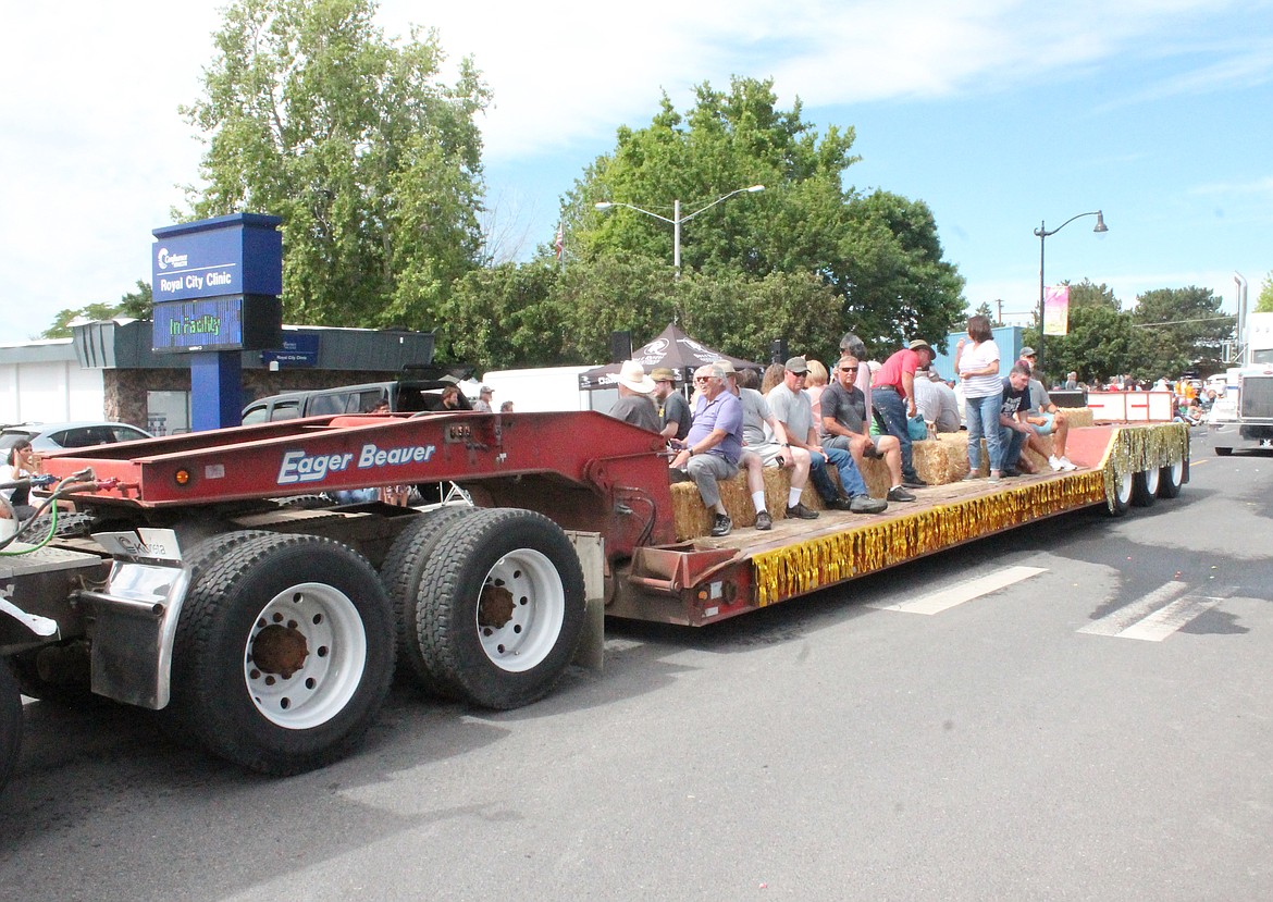 The Royal High School Class of 1972 takes a ride through their hometown in the Summerfest parade.