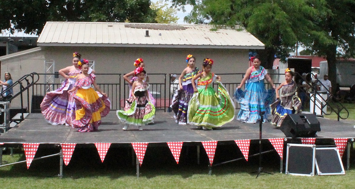 Ballet Sol Y Luna dancers whirl in the park during the Royal City Summerfest Saturday.