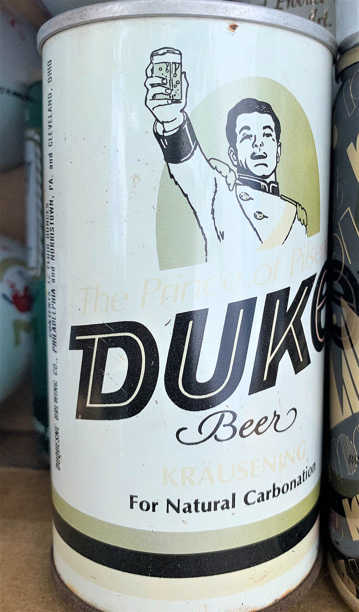 A Duke's Beer can is part of Brock Lambert's collection that he is selling before getting married.