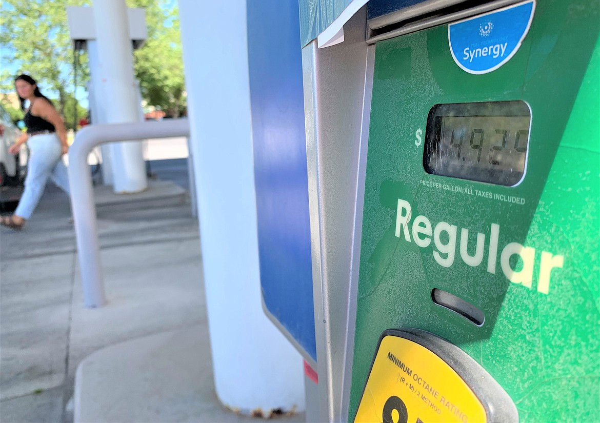 A customer walks to their car at the Ironwood Drive gas station at Albertson's in Coeur d'Alene on Monday. A gallon of unleaded was $4.92.