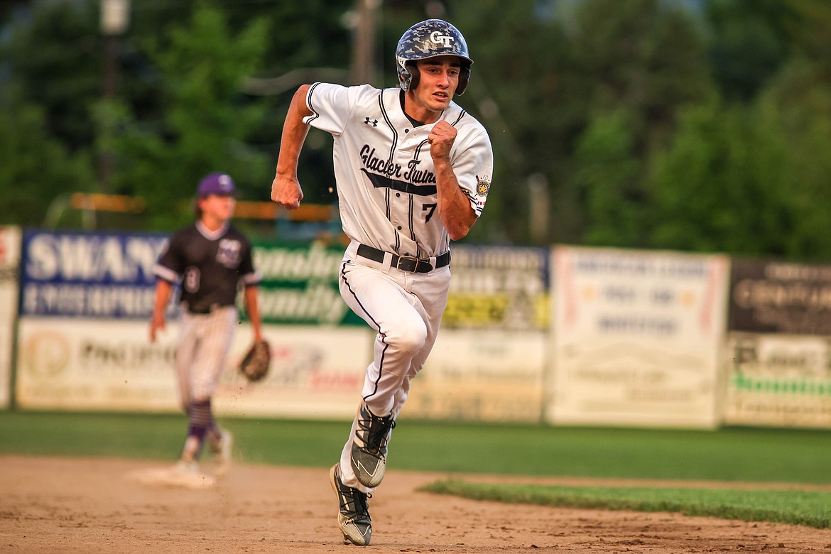 Kellen Kroger runs for home on Thursday at Memorial Field. (JP Edge photo)