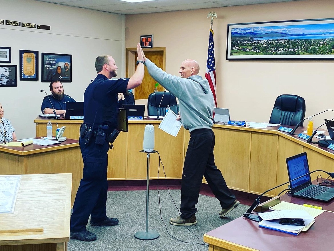 Sergeant Aaron Sutton and Mayor Eric Huffine.