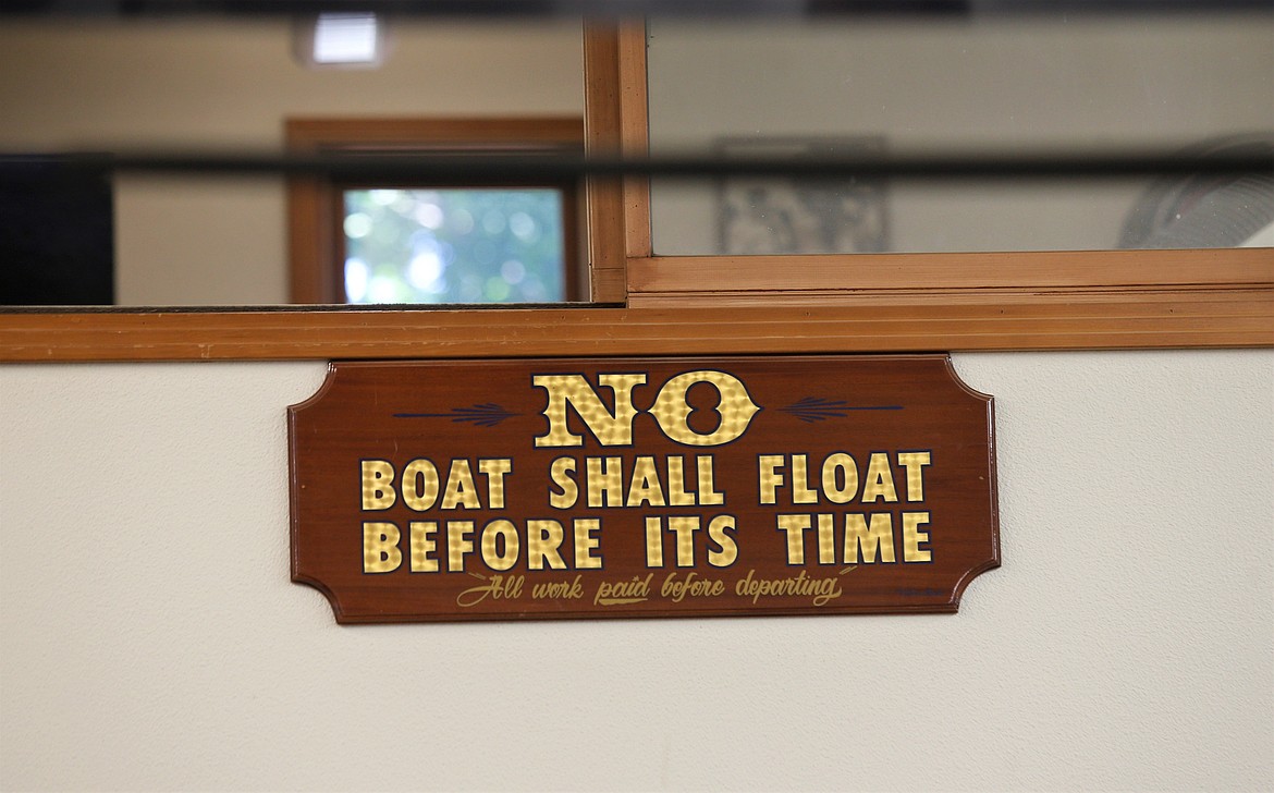 This sign is high on the wall in a shop on Syd Young's Huetter property that is home to Dreamboats, Inc.