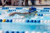 Summer swim team wins home meet