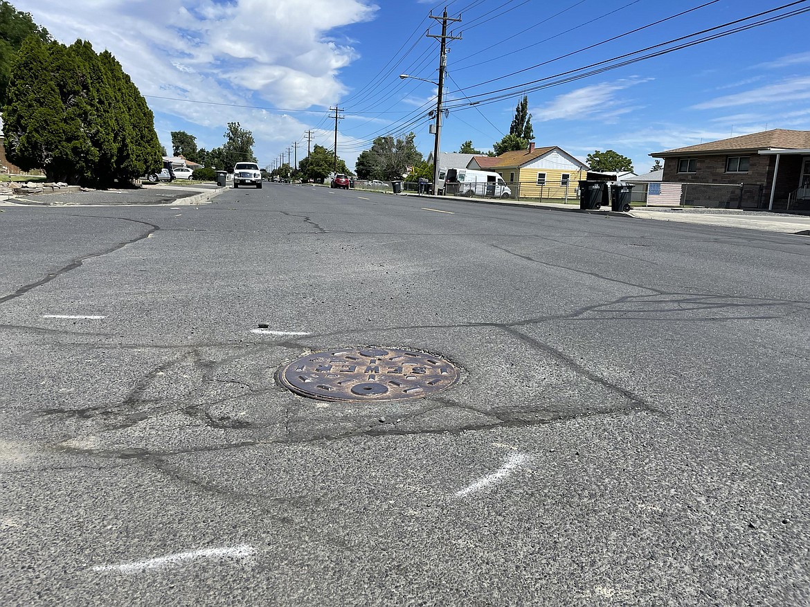 A street-level shot of W. Peninsula Drive near the intersection with Florence Avenue in Moses Lake. The entire length of W. Peninsula Drive is going to be recovered as part of the city’s chip seal and crack seal program in 2022, which was approved by the city council at a regular meeting on Tuesday.