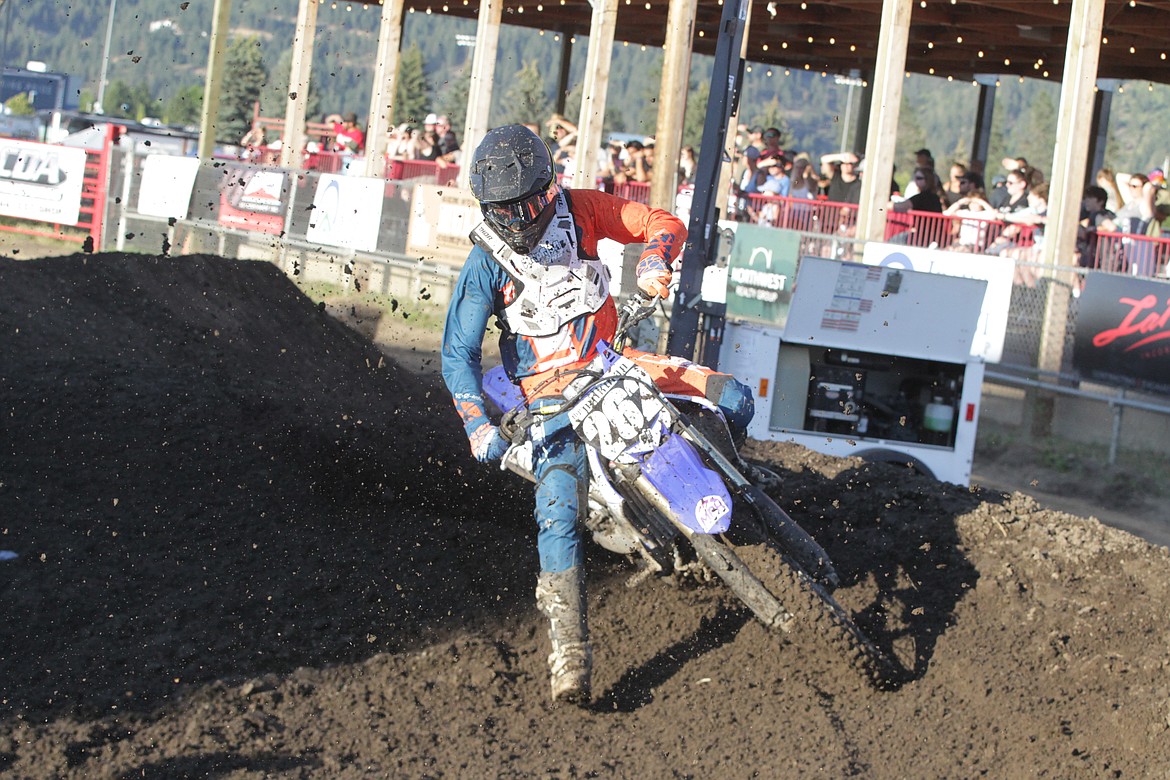 JASON ELLIOTT/Press
Brahn Bjornson of Post Falls works around a corner in the first heat of the 450 Pro Class at the Arenacross event at the Kootenai County Fairgrounds.