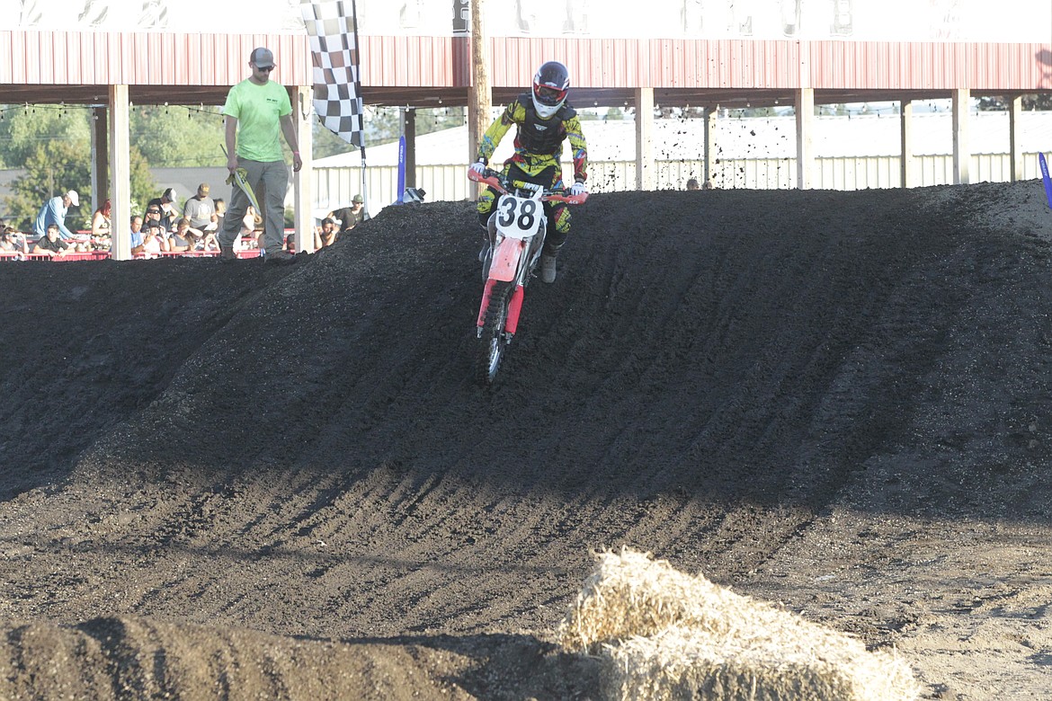 JASON ELLIOTT/Press
Isaac Kay of Coeur d'Alene competes in a 250 Beginner race during the Arenacross event at the Kootenai County Fairgrounds.