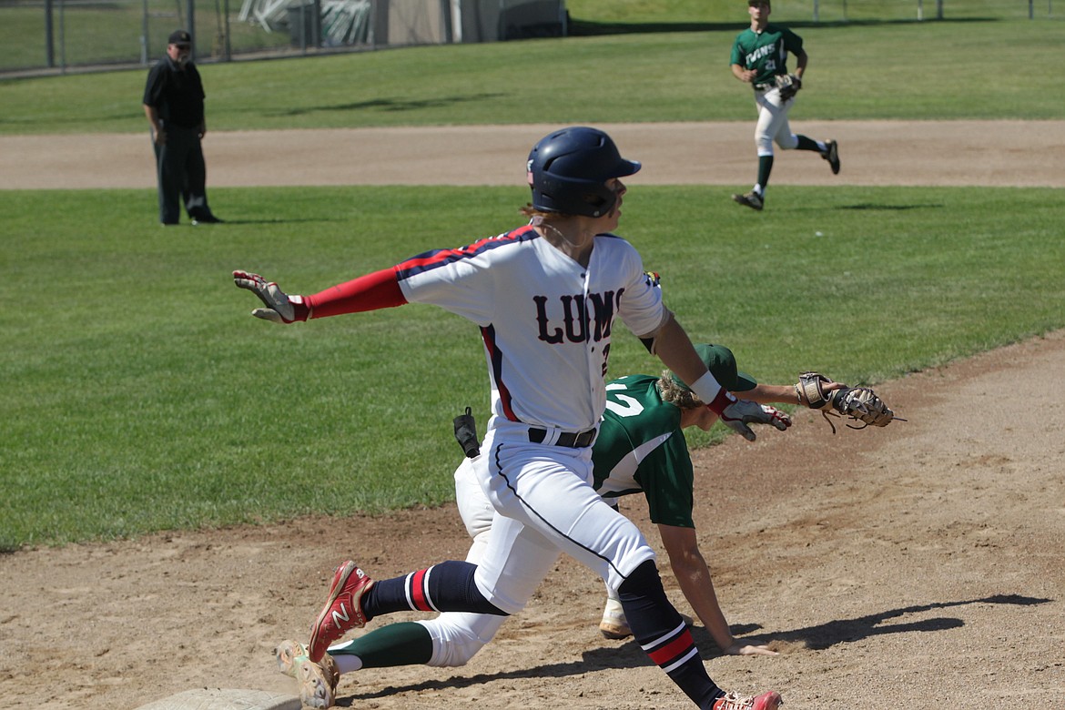 JASON ELLIOTT/Press
Coeur d'Alene Lumbermen hitter Cooper Erickson beats out a relay throw to first base during the third inning of Saturday's first game in Class AA Area A best-of-3 series against Lewis-Clark at Thorco Field.