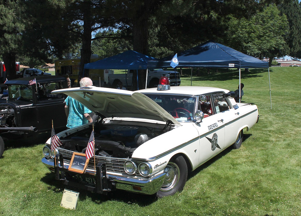 This 1962 State Patrol cruiser at the Othello All-City Classics car show this weekend came complete with lights, sirens, handcuffs and other law enforcement paraphernalia.