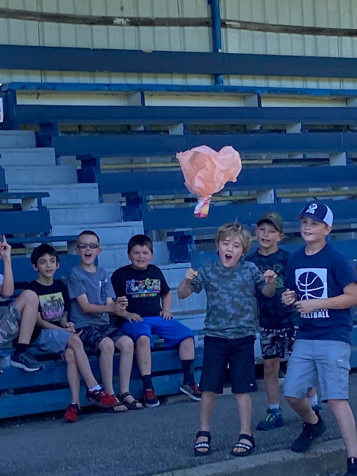 Robotics campers excited during the egg toss.