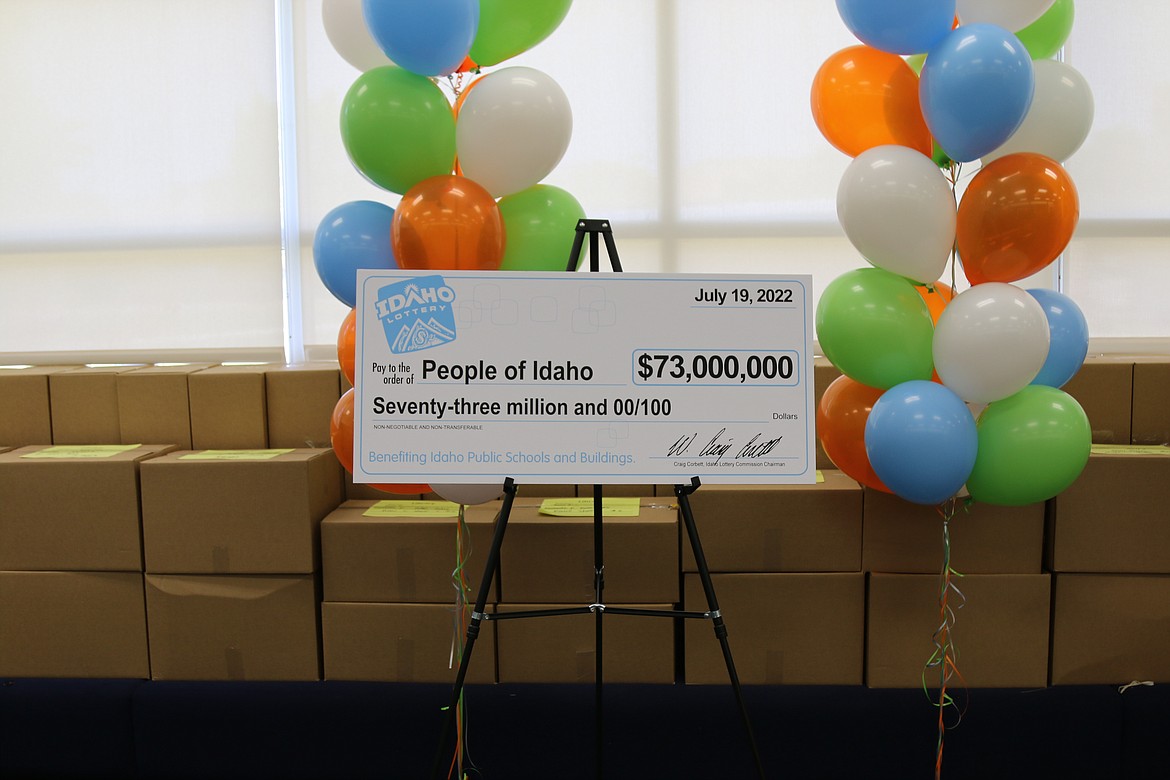 A check represents the $73 million dollars paid to the people of Idaho through Idaho Lottery games.