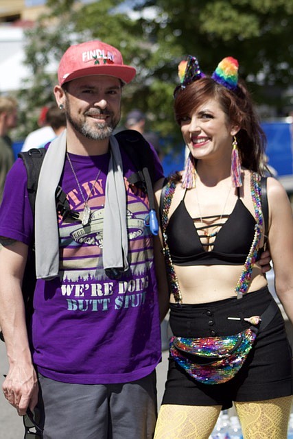 Couple poses at PRIDE Festival 2022 in the Granary Art District