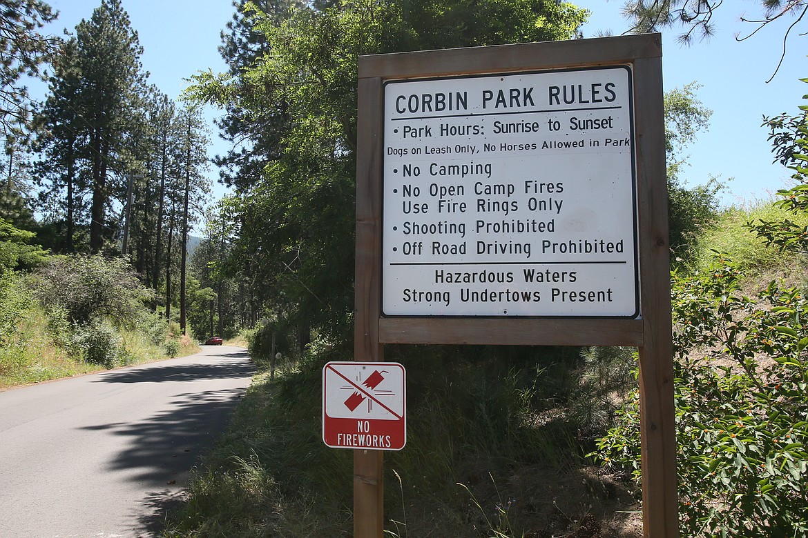 Hazardous waters with a strong undertow are indicated on signs posted at Corbin Park in Post Falls. DEVIN WEEKS/Press