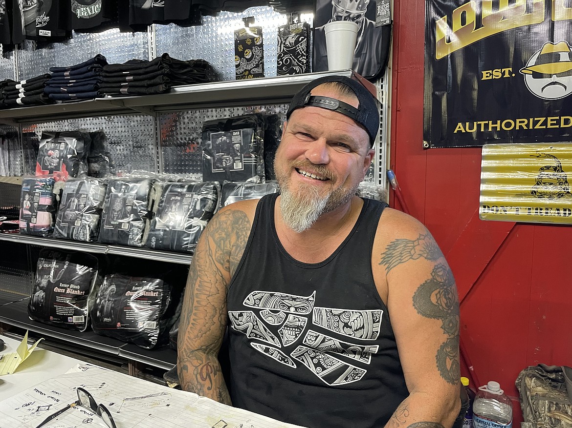 Paul Carney, the owner of EDUBS C/S, in the clothing and custom auto detailing shop he’s busy putting together at 1102 W. Broadway Ave. Carney is hosting a big party on Saturday, complete with a lowrider show and Lucha Libre Mexican wrestlers, to celebrate his business’ grand opening.