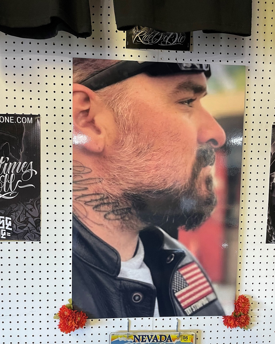 A photo of Eric “E DUBB” Kreuger, the namesake of EDUBS C/S, a custom auto detailing shop and clothing company owned by his brother Paul Carney. “C/S” means “con safos” — with safety — in Spanish, and is a saying used by Mexican Americans.