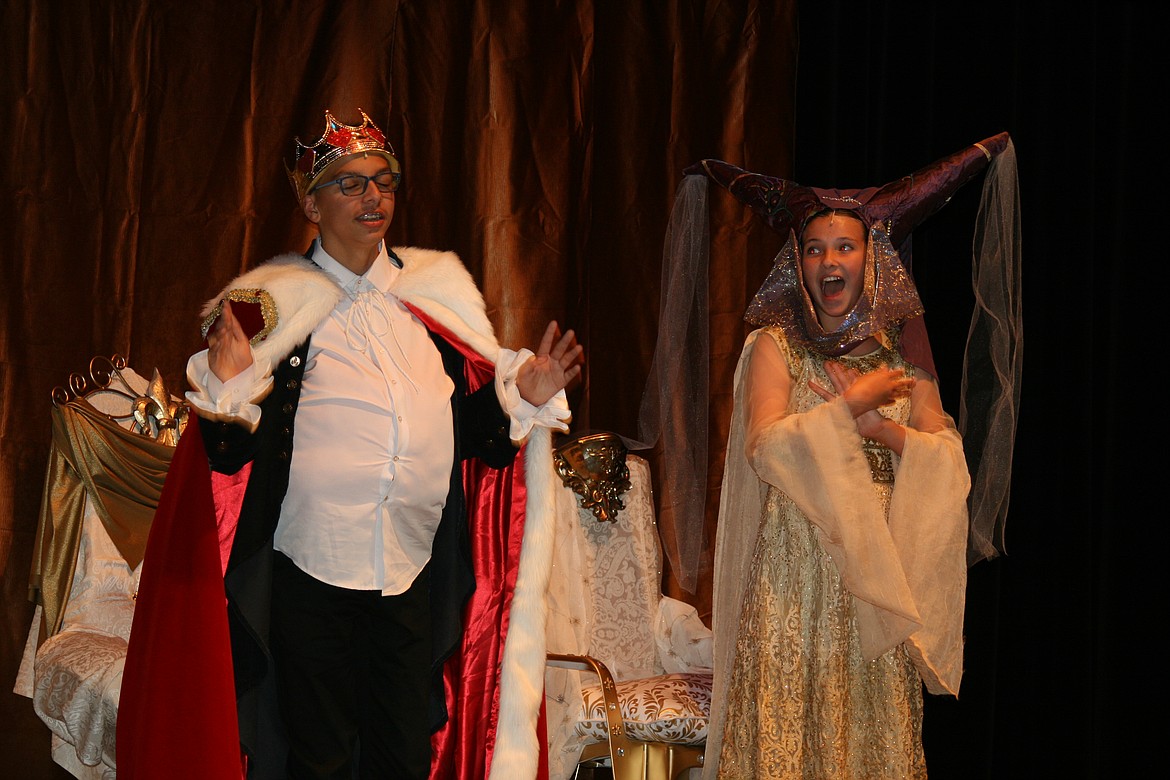 The King (LJ Beavers, left) and Queen (Haley Dalton, right) discuss the most important party in the kingdom in “Cinderella.”