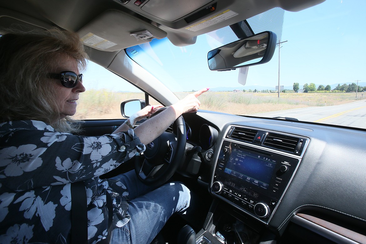 Kaye Balk drives on roads near her Post Falls home, where development is quickly devouring rural areas. She and her husband, Jerry, and neighbor Denny Wagoner have voiced concerns about a 41-acre annexation the city is being asked to consider, where businesses and apartment buildings could potentially be built.