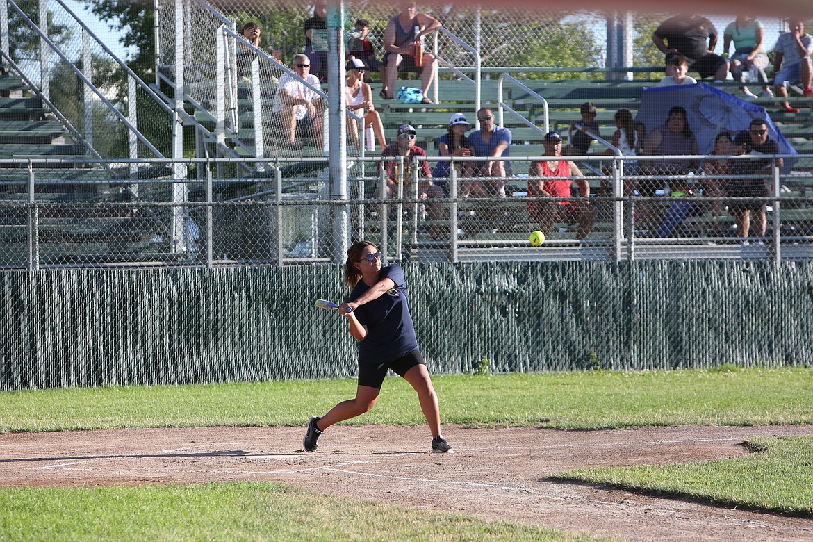 The slowpitch softball game was played on a reduced field, and allowed runners to sub in for hitters who got on base.