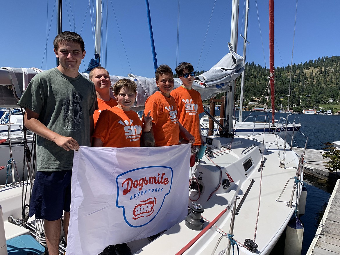 A crew from Specialized Needs Recreation enjoys an excursion with Dogsmile Adventures, a nonprofit that provides paid and donated sailing experiences in North Idaho.