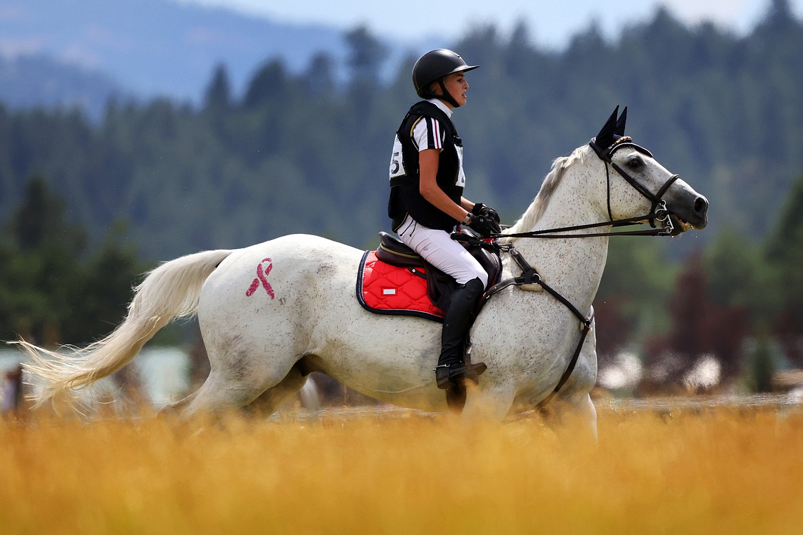 A riders makes her way through the course at The Event at Rebecca Farm July 22. (Jeremy Weber/Daily Inter Lake)