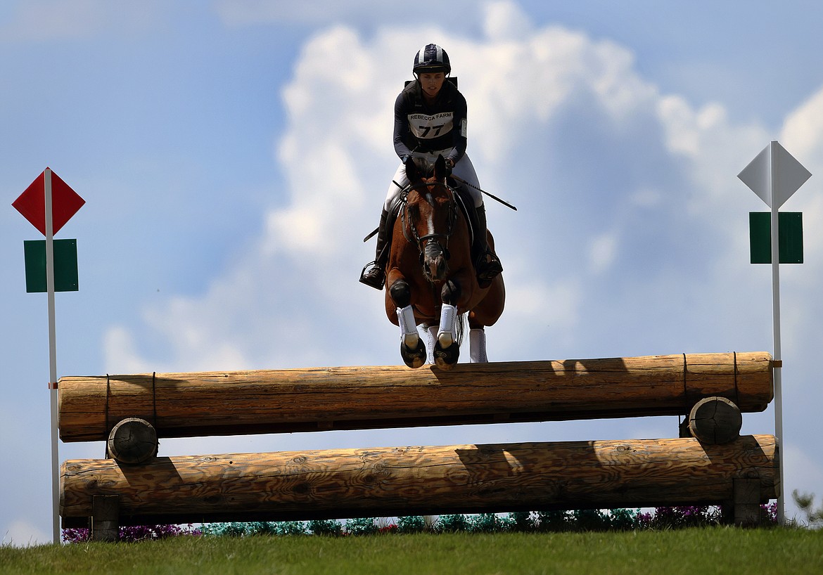 Nicole Aden clears an obstacle during The Event at Rebecca Farm July 23. (Jeremy Weber/Daily Inter Lake)