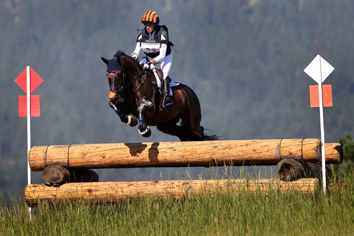 Elisabeth Halliday-Sharp rides "Cooley Nutracker" over an obstacle at The Event at Rebecca Farm July 23. (Jeremy Weber/Daily Inter Lake)