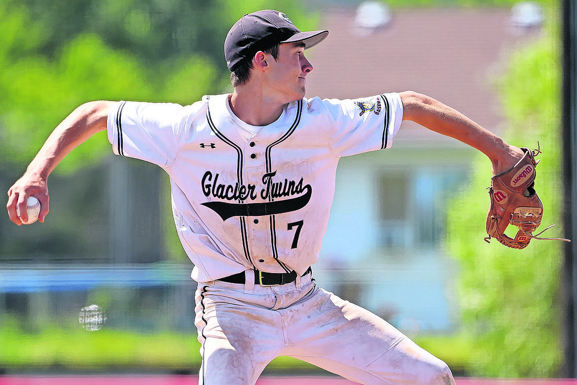 Glacier Twins pitcher Kellen Kroger makes the throw to first base after fielding a ground ball in the American Legion West A District Championship in Kalispell on Sunday, July 24. (Jeremy Weber/Daily Inter Lake)