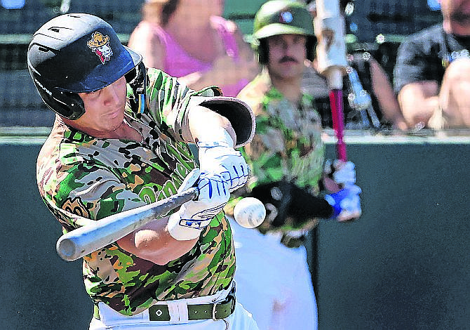 Range Riders’ third baseman Dean Miller connects with a pitch in Glacier’s home game against Idaho Falls on Sunday, July 24. (Jeremy Weber/Daily Inter Lake)