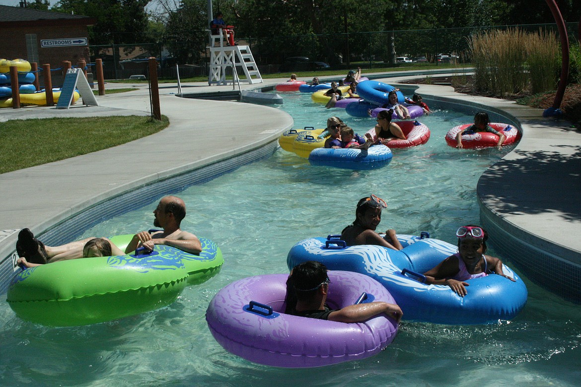 Swimmers take their ease on the Lazy River ride at the Surf ‘n Slide water park in Moses Lake Monday. High temperatures at or near record-breaking levels are expected this week.