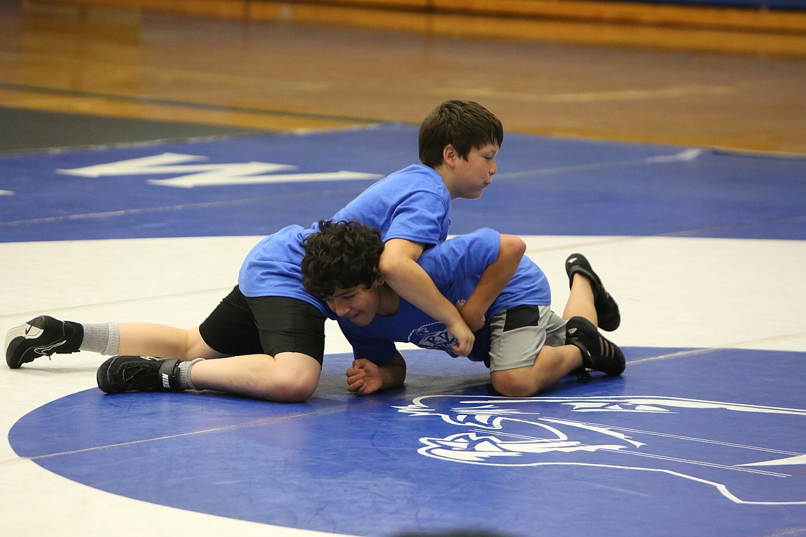 Wrestlers were paired up and practiced their new techniques against each other throughout the sessions of the camp.