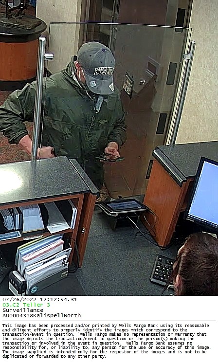 Kalispell Police officers are asking for the public's help in identifying this man, who they say robbed a bank on U.S. 93 on Tuesday. (Photo courtesy the Kalispell Police Department)