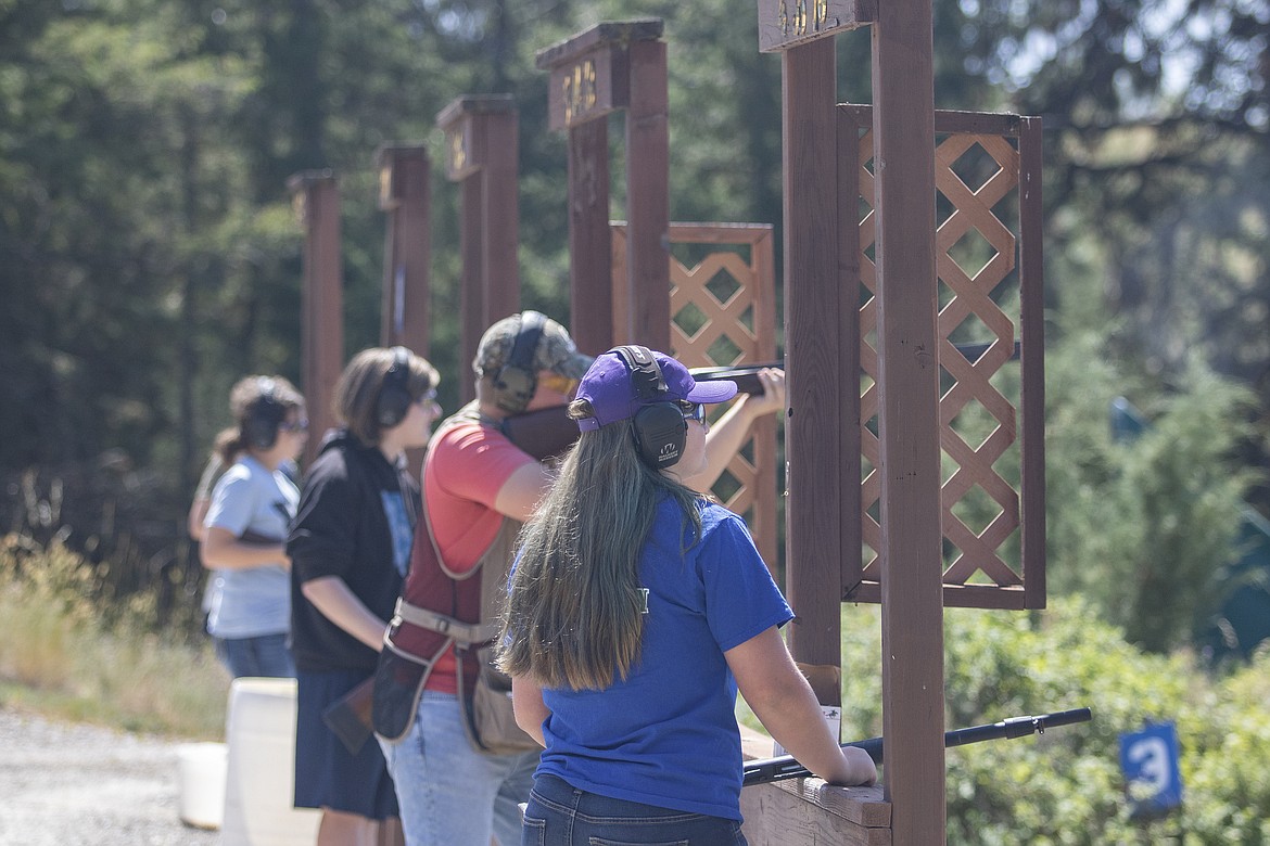 A group of 4-H shooters enjoy a day of sun and competition. (Rob Zolman/Lake County Leader)