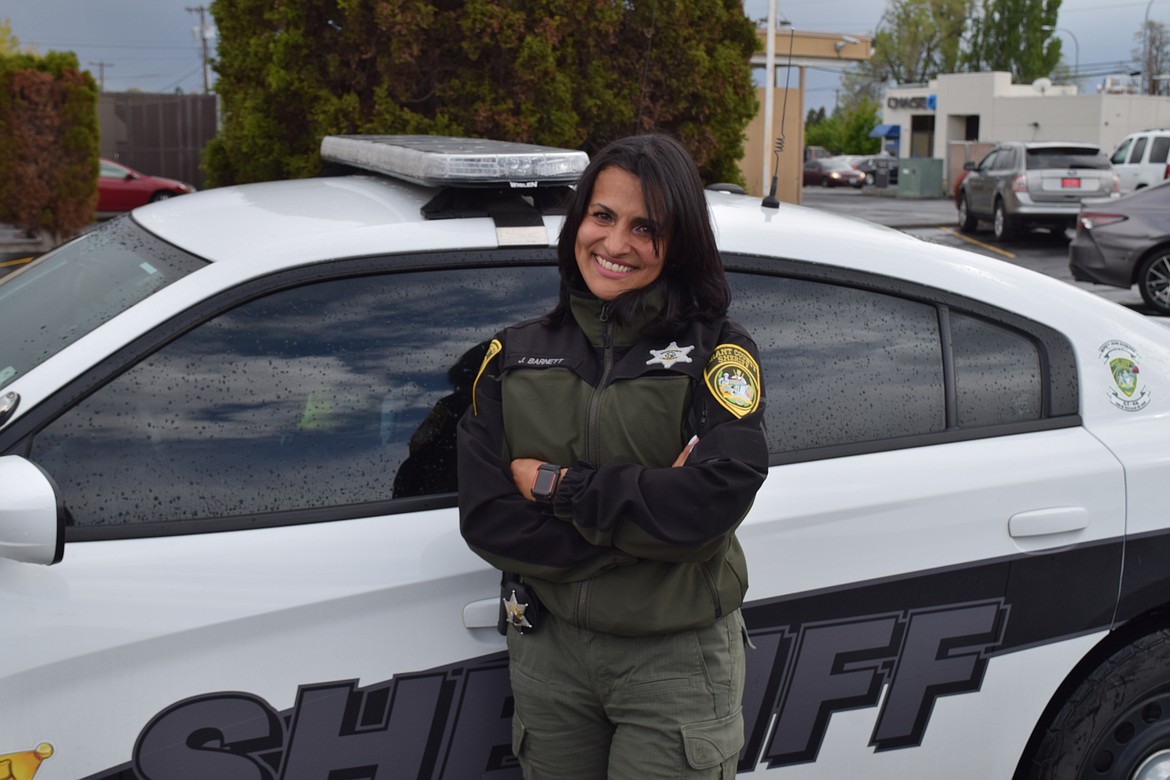 Grant County Sheriff’s Office Deputy Jenny Barnett has done a little bit of everything — including singing in a mariachi band in her native Colombia.