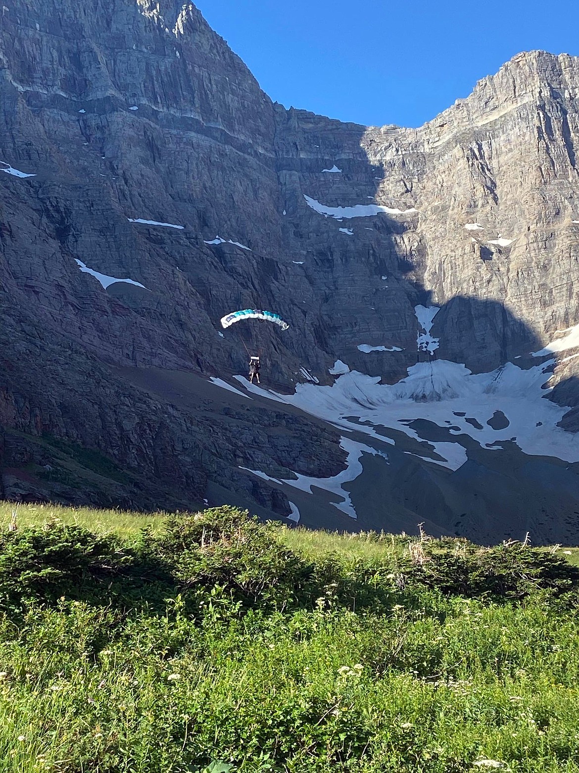 Glacier National Park rangers are hoping to uncover the identity of this individual who BASE jumped off Mt. Siyeh Sunday morning. (Jody Hildreth photo)