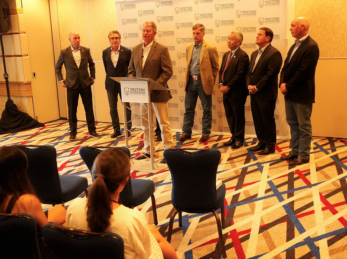 Idaho Gov. Brad Little speaks during a press conference before the start of the Western Governors' Association meeting at The Coeur d'Alene Resort. He is joined by, from left, Utah Gov. Spencer Cox, North Dakota Gov. Doug Burgum, Colorado Gov. Jared Polis (obscured) Wyoming Gov. Mark Gordon, Hawaii Gov. David Ige, Arizona Gov. Doug Ducey and Montana Gov. Greg Gianforte.