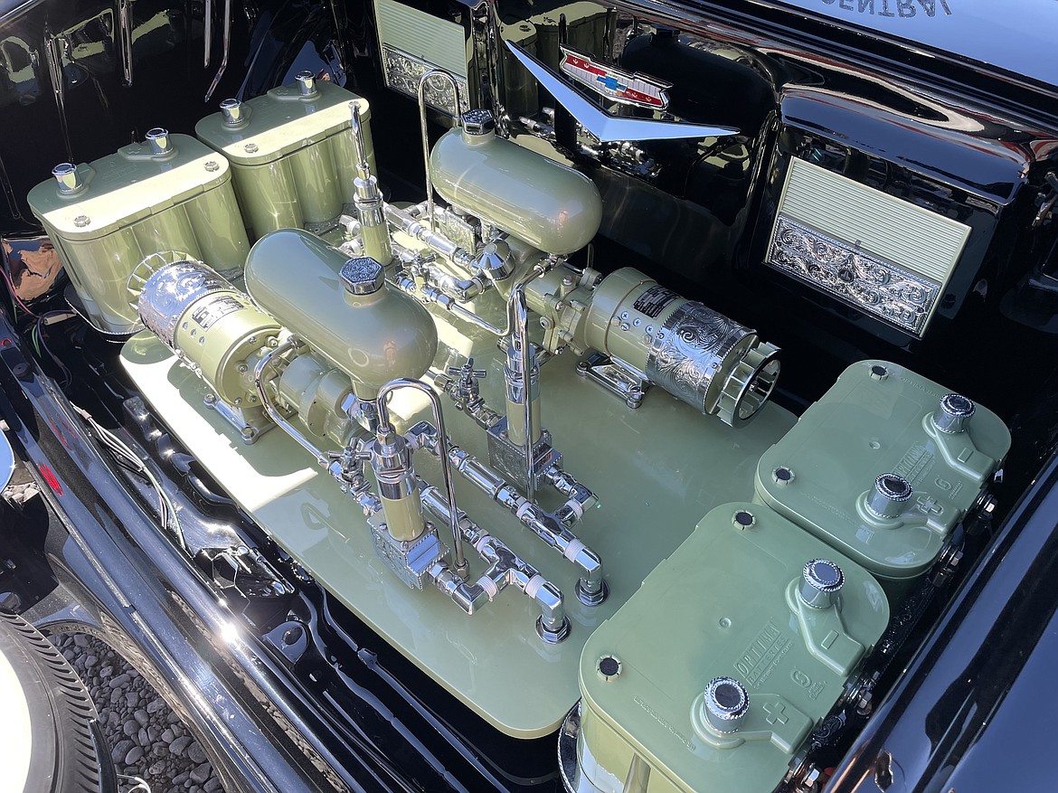 The hydraulic compressors in the trunk of Dillon Arcega’s 1956 Chevrolet Bel Air lowrider. Arcega said he used aircraft hydraulic equipment in his car because it was made at the same time as the auto, and allows him to raise and lower the car’s suspension.