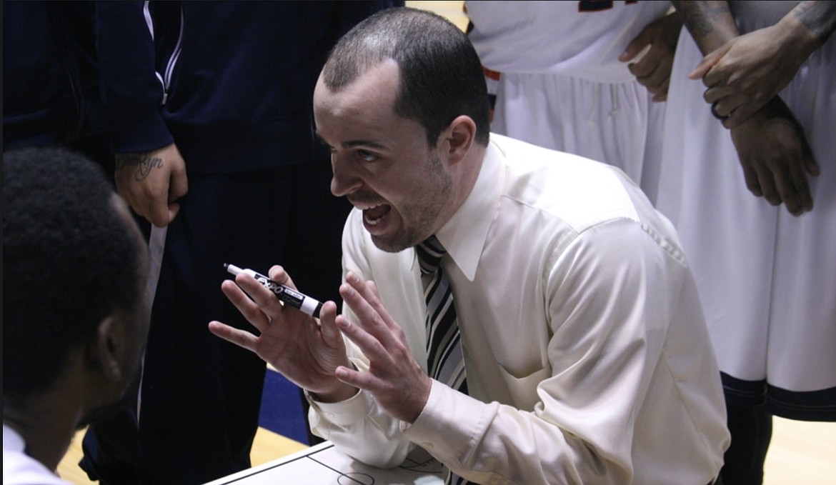 John Meeks breaks down a play with his team during a game. Meeks was named to his first college head coaching role at the age of 25.