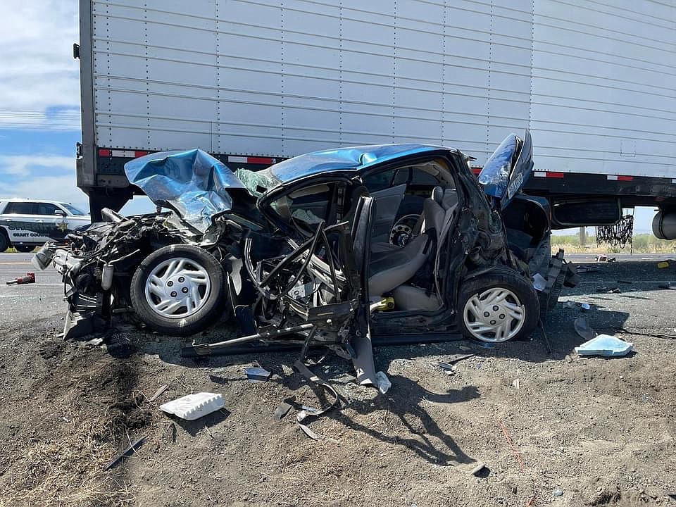 The remains of a 2002 Saturn hit by a semitractor-trailer in a six-car accident on S.R. 281 Wednesday afternoon. According to Washington State Patrol Trooper Jeremy Weber, the driver only sustained minor injuries and was transported to Quincy Valley Medical Center.