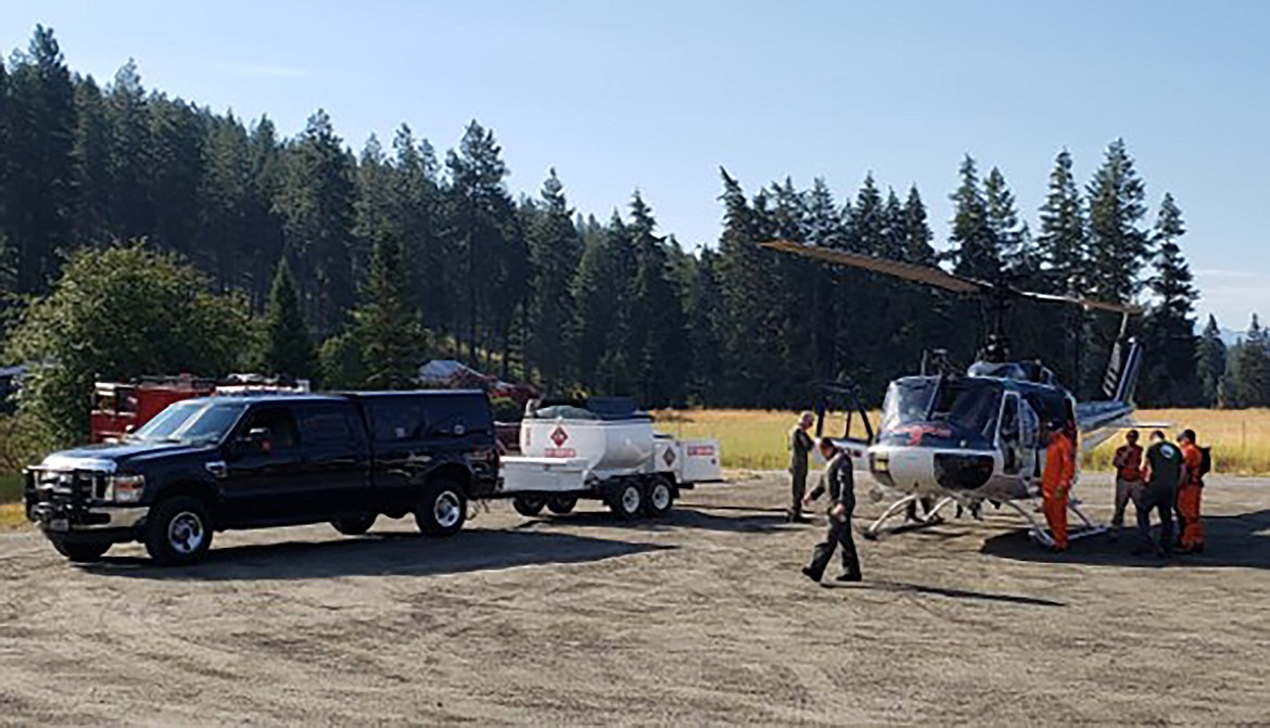 Rescue crews get ready to head out in a search for lost huckleberry picker. Kuy Lonh, 54, was last seen around in the vicinity of Bethlehem Mine/Camp Nine Road — about 12 miles north of Bonners Ferry.