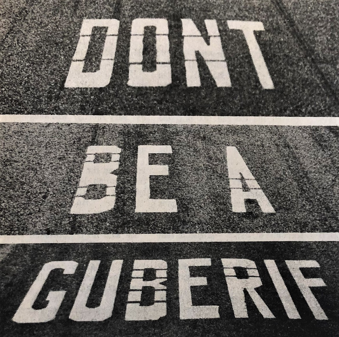 “Don’t Be A Guberif” sign on H41 near Rathdrum in July 1982.