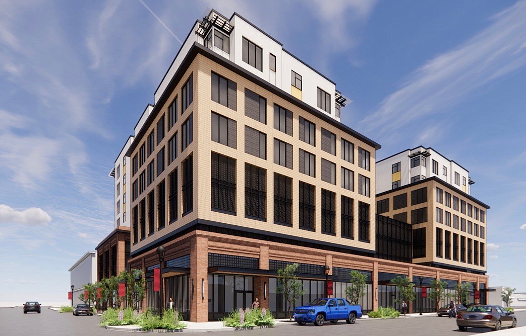 An artist rendering by A&E Design shows an eight-story parking garage and multi-family housing project proposed by the Montana Hotel Dev Partners for the city parking lot at First Street West and First Avenue West.