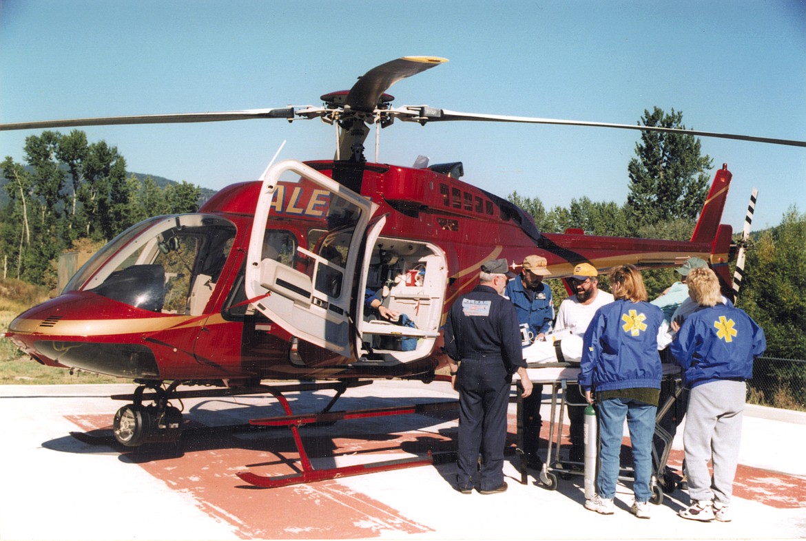 A patient is loaded into the A.L.E.R.T. helicopter. (Photo courtesy of Logan Health)