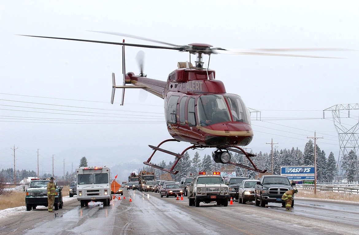 The A.L.E.R.T. helicopter responds to a crash on Hwy.2 (Photo courtesy of Logan Health)