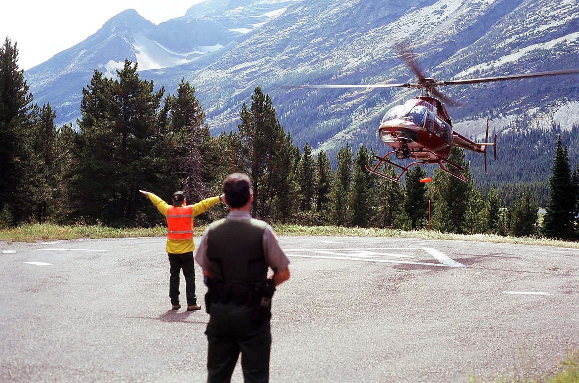 The A.L.E.R.T. helicopter comes in for a landing in a mountainous area. (Photo courtesy of Logan Health)