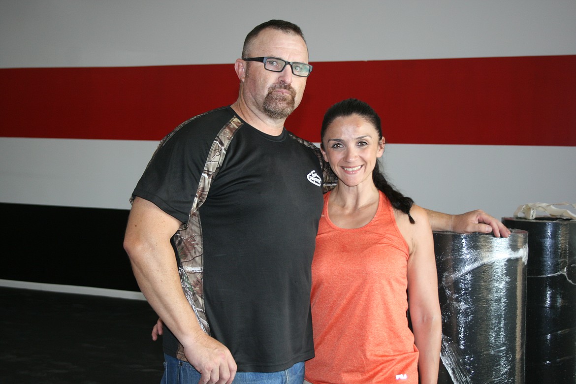 Jab Fitness owners Jonathan and Elizabeth Garza. The gym is reopening within the next few weeks, about a year after a fire that closed it.