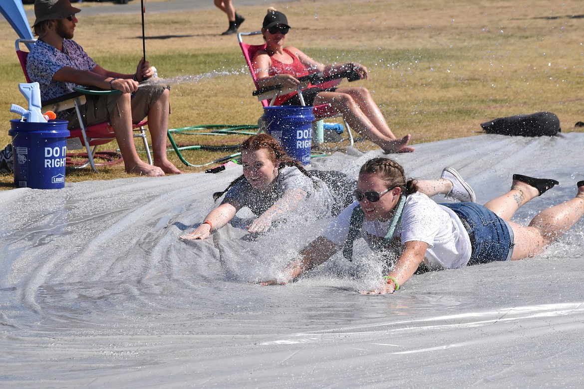 The 100-plus-degree days were fought by Shedders with water slides, water sprayers and misters.
